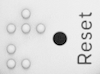 Small pinhole button