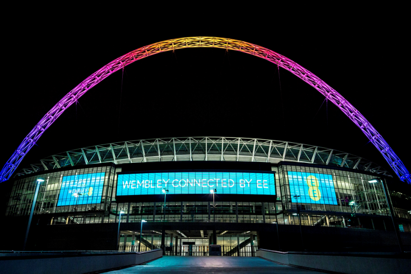 Fan using their mobile phone inside Wembley Stadium